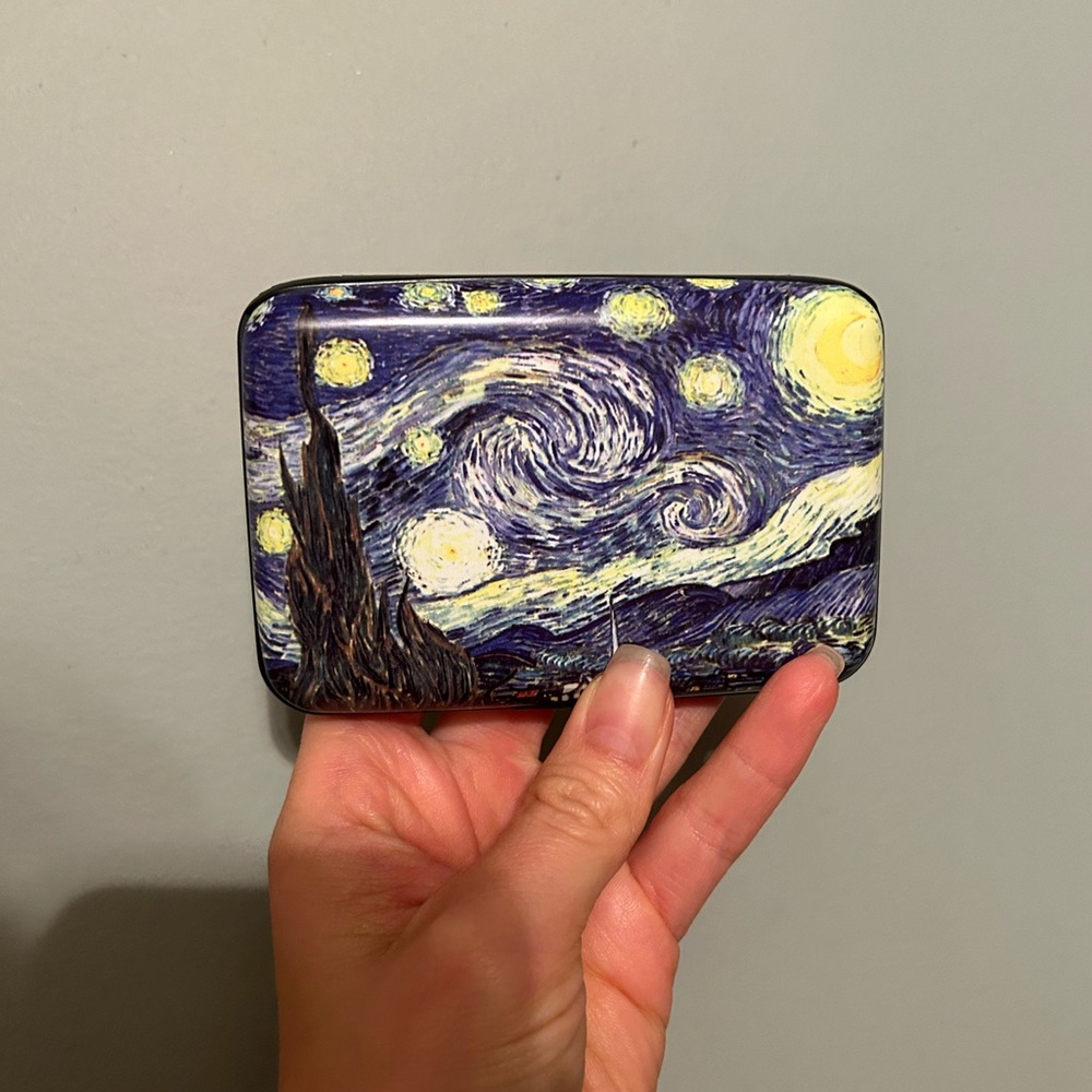 Hard shelled mini wallet